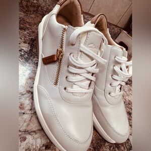 Clarks women’s White Leather Sneakers with Gold Zip Accent